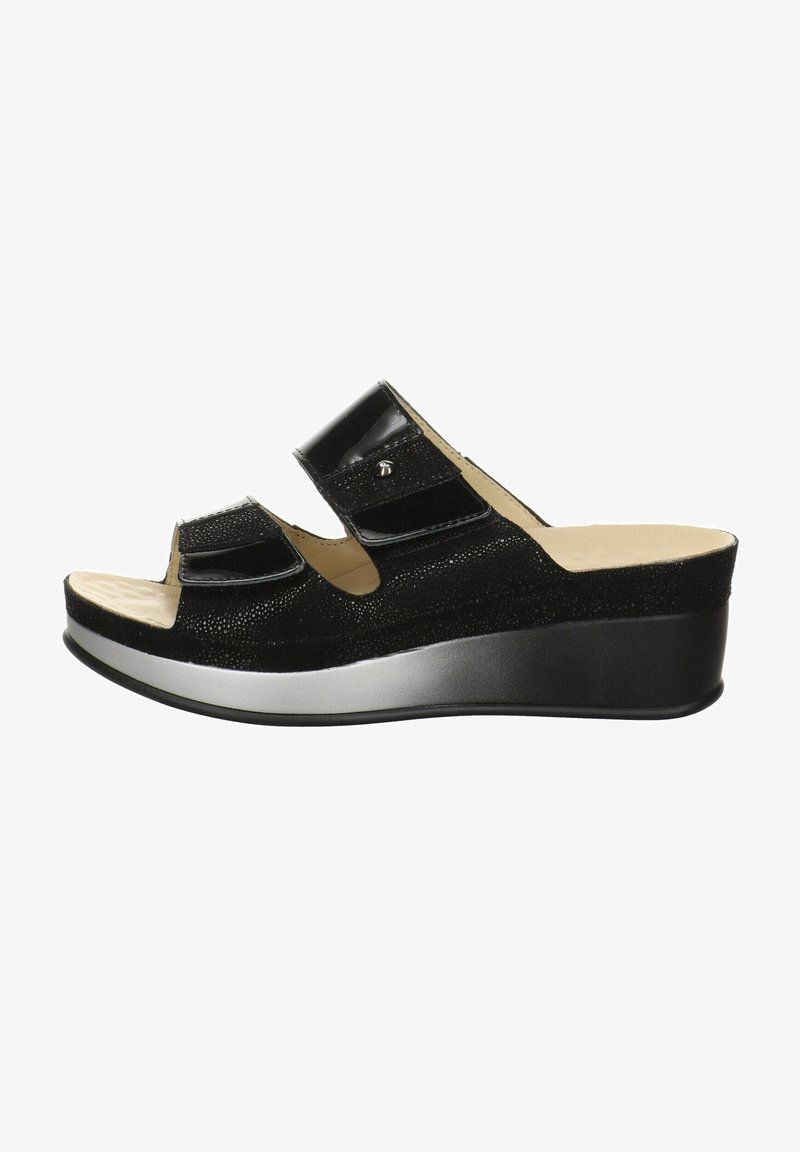 Sandales compensées noires avec deux brides réglables en velcro, matériau supérieur texturé et semelle intérieure lisse beige. Accents argentés à la base.