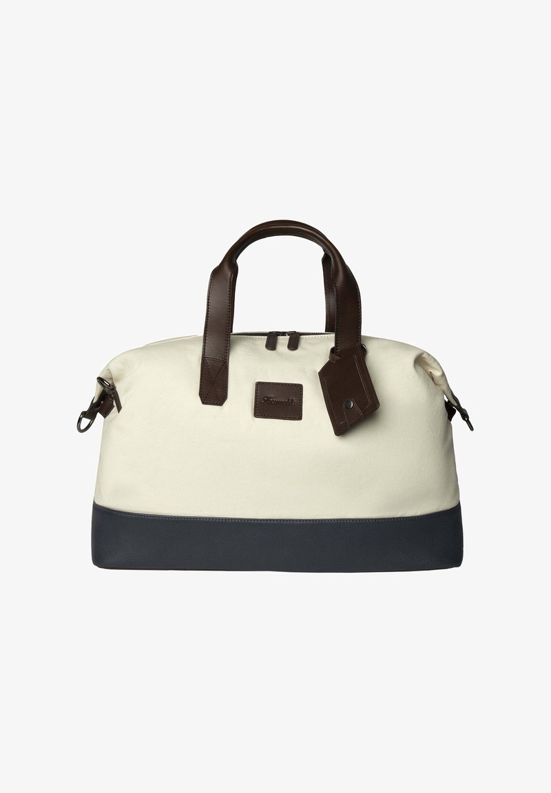 Borsone in tela con parte superiore crema e fondo in pelle blu, manici in pelle marrone e un'etichetta. Presenta una chiusura con zip e un patch con logo.