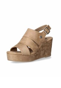 Sandali con zeppa in suede beige, con cinturini incrociati e una cinghia alla caviglia regolabile. Design aperto sulla punta e tacco in zeppa texturizzato.