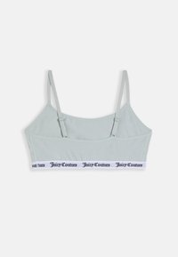 Svetlozelená bralette s tenkými nastaviteľnými ramienkami, ktorá má biely pás s logom "Juicy Couture". Hladká tkanina, jednoduchý dizajn, bez kostíc.