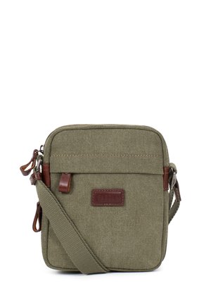 Petit sac bandoulière carré en toile vert olive avec sangle réglable, tirettes de fermeture éclair en cuir marron et écusson logo.
