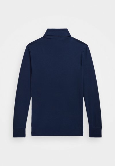 Polo-shirt à manches longues navy avec un col replié, fabriqué à partir d'un tissu lisse, doté de manches longues et d'un ourlet droit.