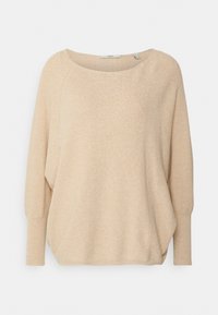 Beżowy sweter o luźnym kroju, okrągłym dekolcie i rękawach w stylu balonowym, z miękkim, lekko teksturowanym wykończeniem.