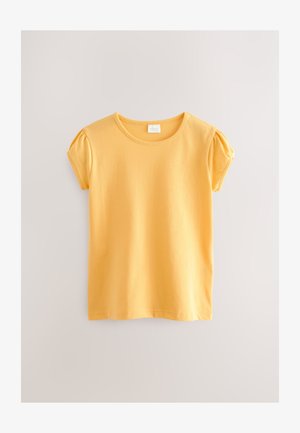 Gul bomullst-shirt med rund halsringning och korta puffärmar. Har en slät yta och enfärgad design.