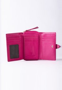 Pink leather wallet with a zip closure, multiple card slots, and a clear ID window. Features a smooth texture and embossed logo.