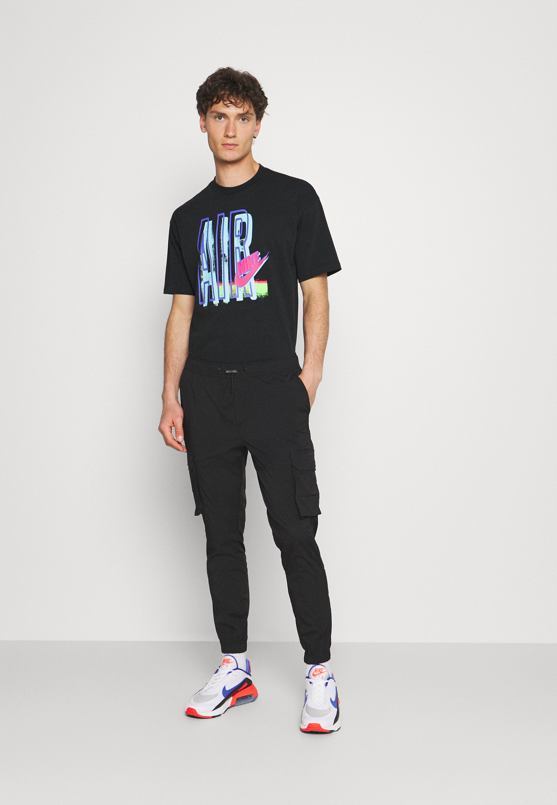 Nike Sportswear TEE AIR LOOSE FIT - Camiseta estampada - black/negro -  Zalando.es