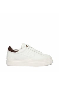 White leather sneaker with a textured finish, brown suede heel accent, flat laces, and a thick rubber sole. Gold eyelet detail.