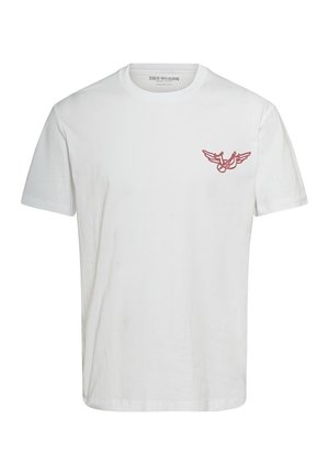 Biała koszulka z krótkim rękawem, wykonana z bawełny, z czerwonym logo skrzydlatym na lewej piersi, z klasycznym okrągłym dekoltem.