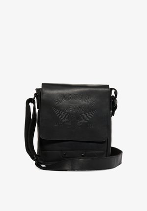 Black leather messenger bag with embossed "Mustang Jeans" logo, flap closure, adjustable strap, and a sleek, smooth texture.
