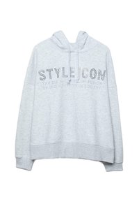 Jasnoszara bluza z kapturem o luźnym kroju. Na przodzie znajduje się ozdobny napis "STYLE ICON" z ćwiekami, a dół i mankiety są wykończone ściągaczem. Miękka tekstura tkaniny.