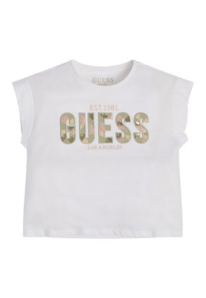Hvid kortærmet skjorte med "GUESS" i store blomsterprintede bogstaver, "EST. 1981" over og "LOS ANGELES" under foran i midten.