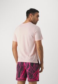 Jordan TOP - Sports T-shirts - legend pink/black