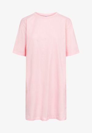 Lyserød oversized t-shirt lavet af blødt bomuld, med rund halsudskæring og korte ærmer. Minimalistisk design uden mønstre eller metaldele.
