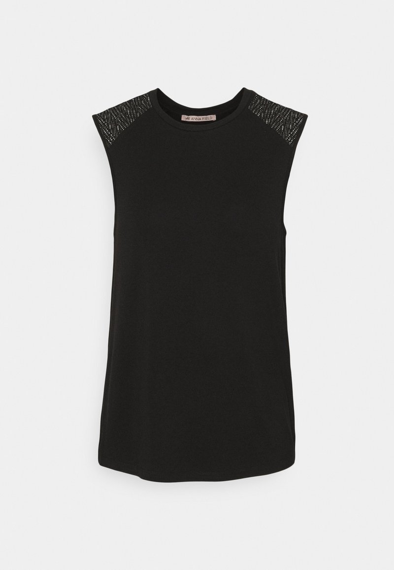 Haut noir sans manches avec encolure ronde et détails perlés sur les épaules, présenté sur un fond blanc uni.