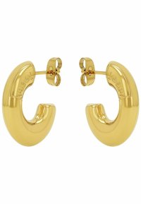 Pendientes de aro en tono dorado con un diseño suave y curvado, que presenta una sección recortada, asegurados con un cierre de palanca. Detalle de logo grabado.