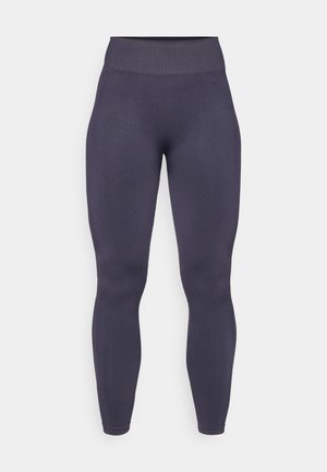 Høyt liv, tettsittende leggings i mørkegrått med en teksturert, ribbet midjebånd og glatt stoff. Har en sømløs design og ingen synlige detaljer.