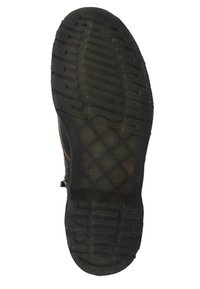 Svart gummisula med djupa mönster, som har upphöjda och platta sektioner för grepp. Materialet ser hållbart och strukturerat ut.