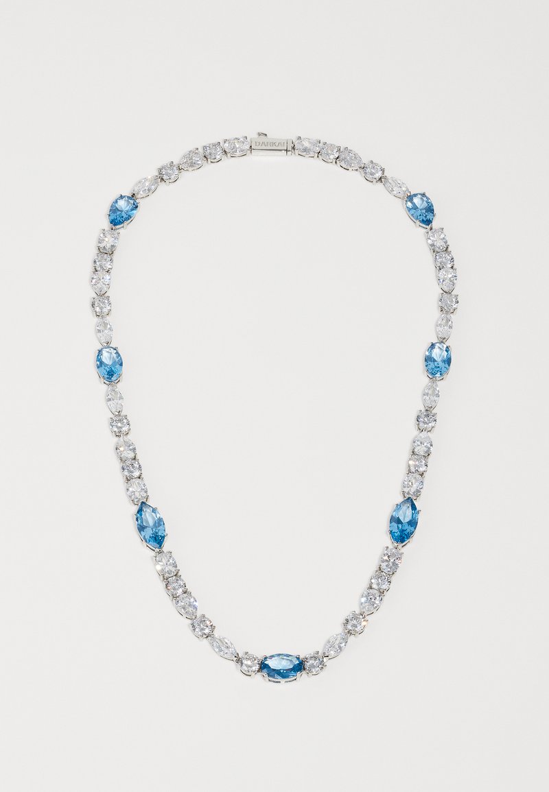 Silver-tone necklace featuring alternating blue and clear gemstones, with a symmetrical design, polished finish, and secure clasp.