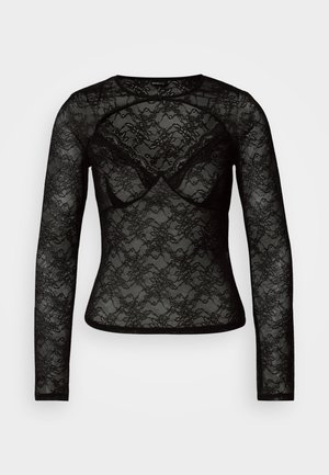 Melnas garām piedurknēm mežģīņu topiņš ar ziedu rakstu, daļēji caurspīdīgu tekstūru, apaļu kakla izgriezumu un pieguļošu dizainu ar maigiem, smalkiem akcentiem.