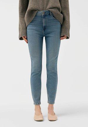 - Jeansy Skinny Fit