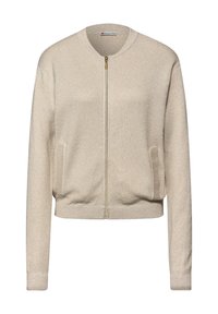 Beżowa kurtka bomberka na zamek błyskawiczny z okrągłym kołnierzem, bocznymi kieszeniami i ściągaczami przy mankietach. Błyszcząca faktura dodaje wizualnego uroku.