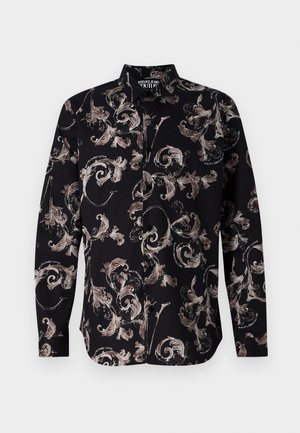 Must must shirt mustus, kus on keerlev lillemuster beežis ja pruunis, valmistatud siledast kangast, pikkade varrukatega ja klassikalise kraega.
