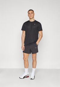 Puma PERFORMANCE TEE - Camiseta deportiva - black