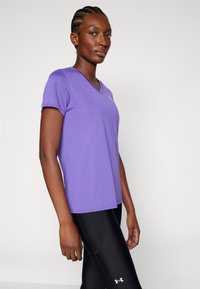 Under Armour SOLID - Sports T-shirts - lavish/white
