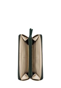 Green zip-around wallet with textured exterior, beige interior, multiple card slots, and central zipper pocket. Zipper hardware visible.