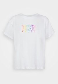 White short-sleeve T-shirt made of cotton, featuring a multicolored "DKNY SPORT" logo on the front in a gradient design.