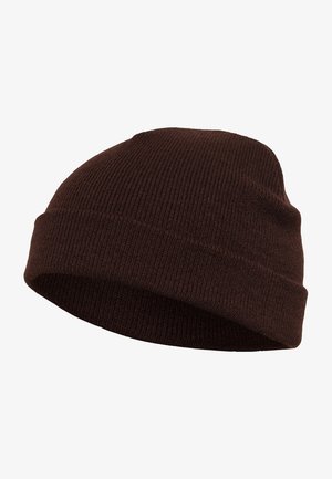 Rudas megztas beanie kepurė su išilginėmis tekstūromis, apvaliu viršumi ir sulenkta kraštu. Medžiaga atrodo minkšta ir šilta, tinkama šaltam orui.