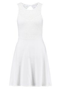 Bílé šaty s krajkovým korzetem, bez rukávů a rozšířenou sukní. Na zadní straně je detail ve tvaru klíčové dírky. Hladká textilie.