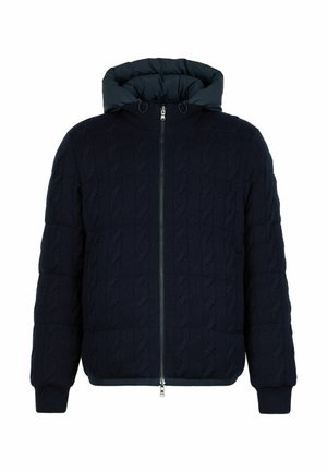 Veste matelassée bleu marine avec texture en tricot torsadé, fermeture éclair à l'avant et capuche rembourrée avec cordons.