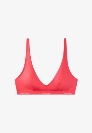 Bralette rosso Calvin Klein con scollo a V profondo e sottili spalline, con fascia elastica con logo alla base.