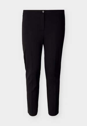 Melnas šauras pieguļošas kostīma bikses ar pogu un rāvējslēdzēja aizdari, priekšpusē kroku detaļu un potīšu garuma apmali uz gaiša fona.