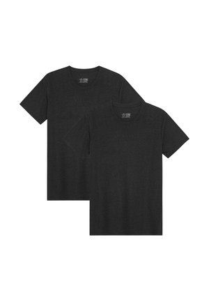 Deux t-shirts noirs unis à manches courtes et col rond, présentés à plat, l’un légèrement superposé à l’autre, sur un fond blanc.