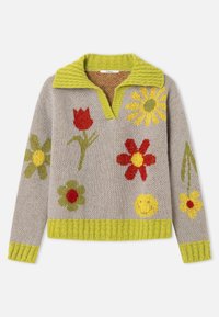 Beige striktrøje med limegrøn krave, manchetter og kant, dekoreret med farverige blomster og et gult smiley-ansigt.