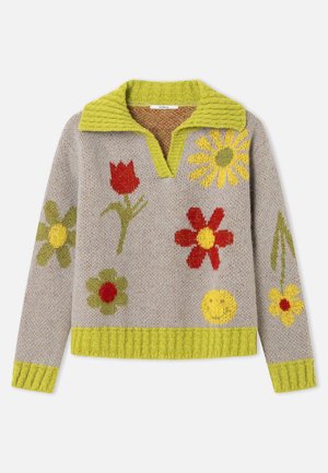 Beige striktrøje med limegrøn krave, manchetter og kant, dekoreret med farverige blomster og et gult smiley-ansigt.