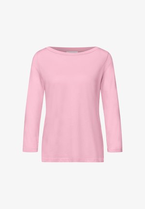 Světle růžová halenka s dlouhým rukávem, lodičkovým výstřihem, jednoduchým designem a rovnou spodní hranou, pohled zepředu na bílém pozadí.