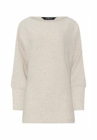 Vaalean beige neule, jossa on leveä venepääntie, pitkät hihat ja ribbikuvio. Pehmeä kangas, rento malli ja minimalistinen muotoilu.
