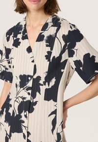 Soaked in Luxury Day dress - oatmeal duotone flower