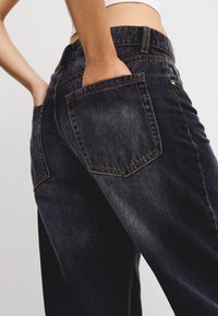 Bershka Flared Jeans - black