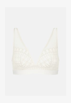 Witte bralette met een diepe V-hals, gemaakt van zachte stof, met delicate kantdetails en een brede, gladde band onder de buste.