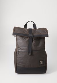 Dark brown roll-top backpack with black strap buckle, front zipper pocket, side pockets, and Barbour logo patch on a white background.