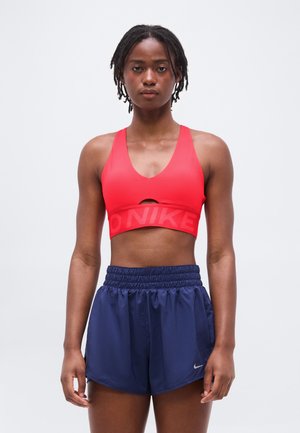 Nike Performance SCULPT BRA - Brassières de sport à maintien normal - light crimson/ember glow/white