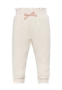 Pantalones de bebé en color crema suave con cintura elástica, decorados con un lazo rosa y puños acanalados en los tobillos.
