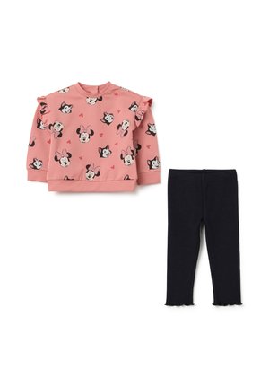 Rosa Sweatshirt mit Rüschensleeves, bedruckt mit Cartoon-Charakteren und Herzen. Kombiniert mit marineblauen Leggings mit gewelltem Saum.