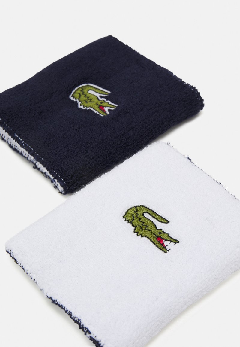 kaos grus Ørken Lacoste Sport WRISTBAND UNISEX - Sweatband - white/navy blue/white -  Zalando.de