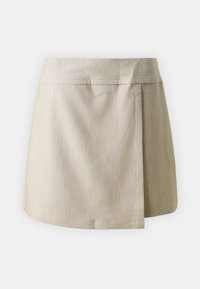 Beige skjørt med en glatt, teksturert stoff. Har en flat linning og en sideløft for ekstra detalj. Klassisk A-linje form.