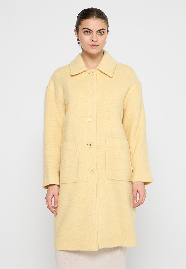 American vintage Mantel geel